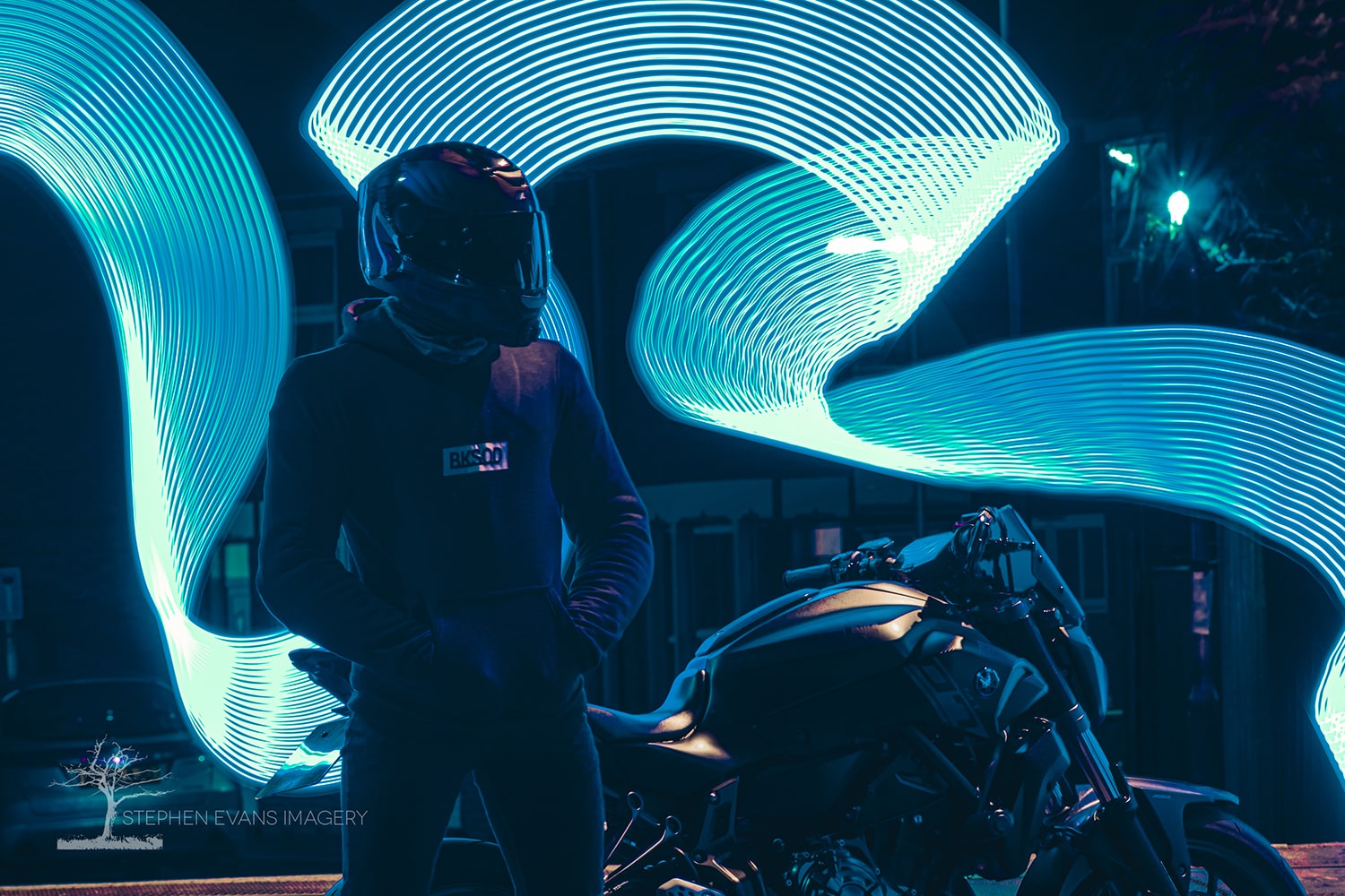 Motorcycle photoshoot featuring light painting effects with slow shutter speed