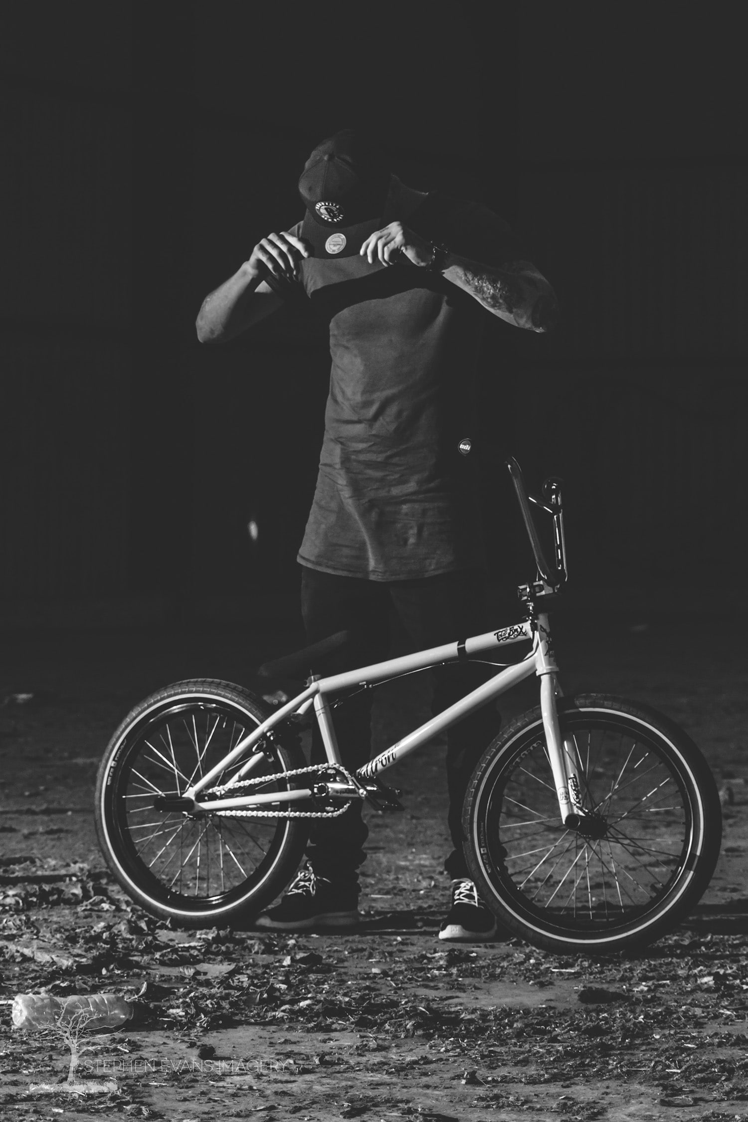 BMX rider Jack posing with his bike at skatepark